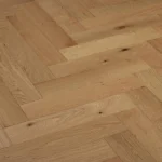 Light oak herringbone wood flooring pattern